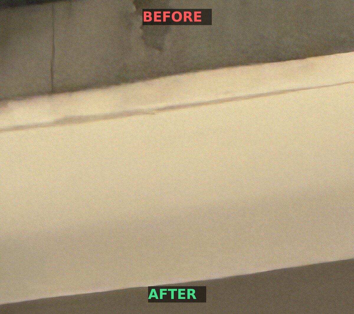The cleaning line on the Belmont Village facade in Coral Gables — stained concrete above, soft-washed clean stone below