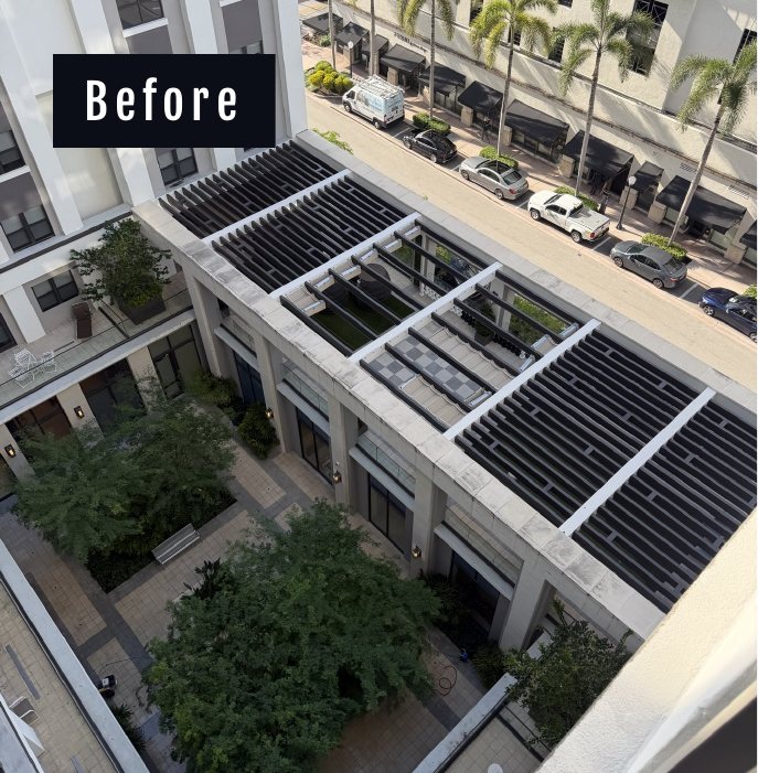 Drone's-eye aerial of the Belmont Village courtyard and pergola before cleaning
