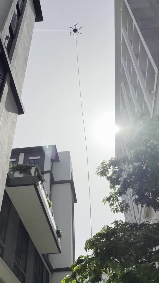 Soft-washing the high-rise facade in flight