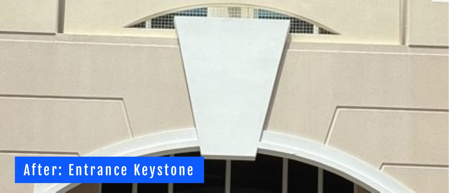 The same entrance keystone after cleaning, the most visible piece of the facade restored